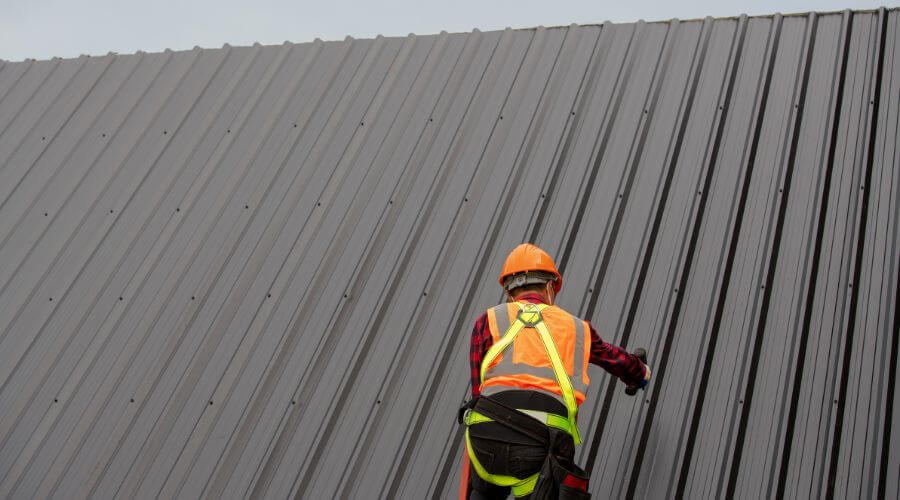 Professional metal roof installation services in Loretto, MI